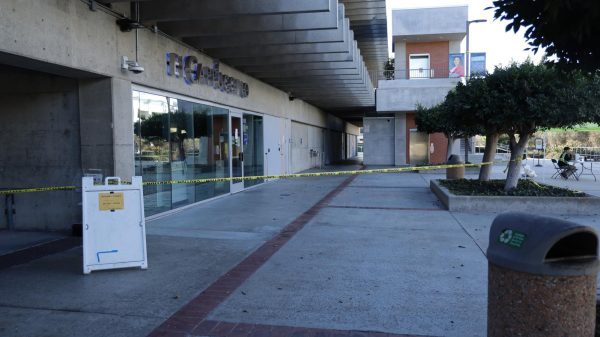 Yellow tape blocks entrances to the El Cappuccino cafe Monday, Nov. 10. The building is expected to be closed until at least Monday, Nov. 24. (Savannah Anderson | The Union)