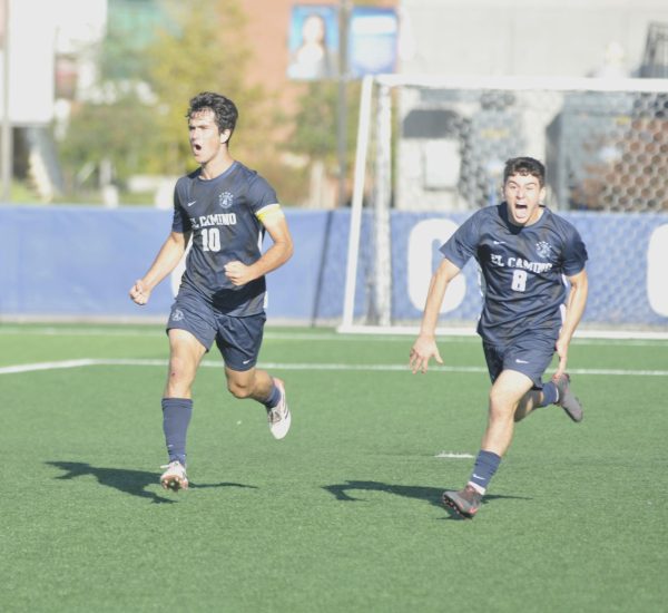 El Camino teammates Jaden Hancock (10) and Arsen Mkhitaryan (8) celebrate after scoring the go-ahead goal early in the second half. The pivotal score completed the Warriors' comeback against Cerritos College on November 7. El Camino went on to win the critical conference matchup by a final score of 2-1.