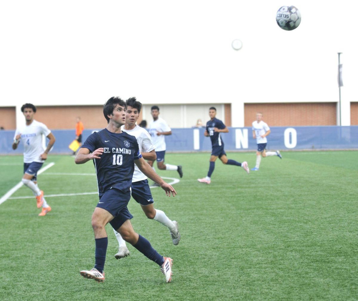 Jaden Hancock (10), a standout player for the Warriors, looks to control the ball during their game against Mira Costa at El Camino College. Despite Hancock's efforts, including his 17th goal of the season, the Warriors fell 3-2. He was a key figure in the tough loss. Photo credit: Juan Carlos Cardoso