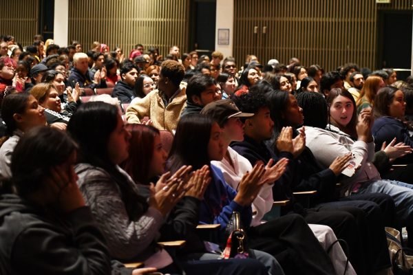 Members of the audience clap after Associated Students Organization President Zaynah Robb finished her five-minute impromptu speech during the Speaker's Forum at the Marsee Auditorium on Tuesday, Nov. 18. Student attendees taking El Camino College communications courses typically get class credit for coming to the event, which raises funds for the forensics program. (Nikki Yunker | The Union)