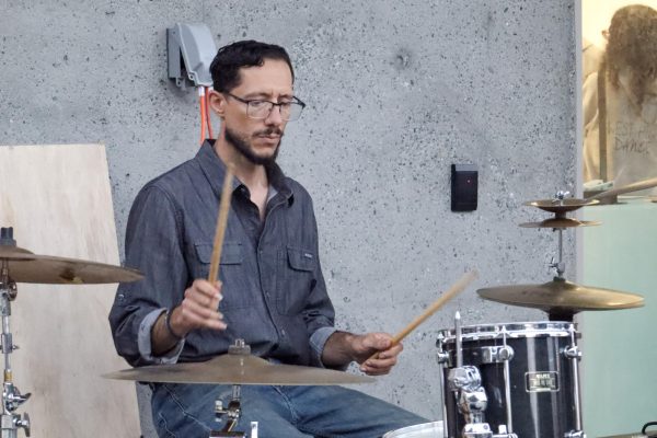 Micheal Nicoli is a drummer and guitarist who played a solo set at the Battle of the Bands on Nov. 12 at the Arts Building. (Donovan Harris | The Union)