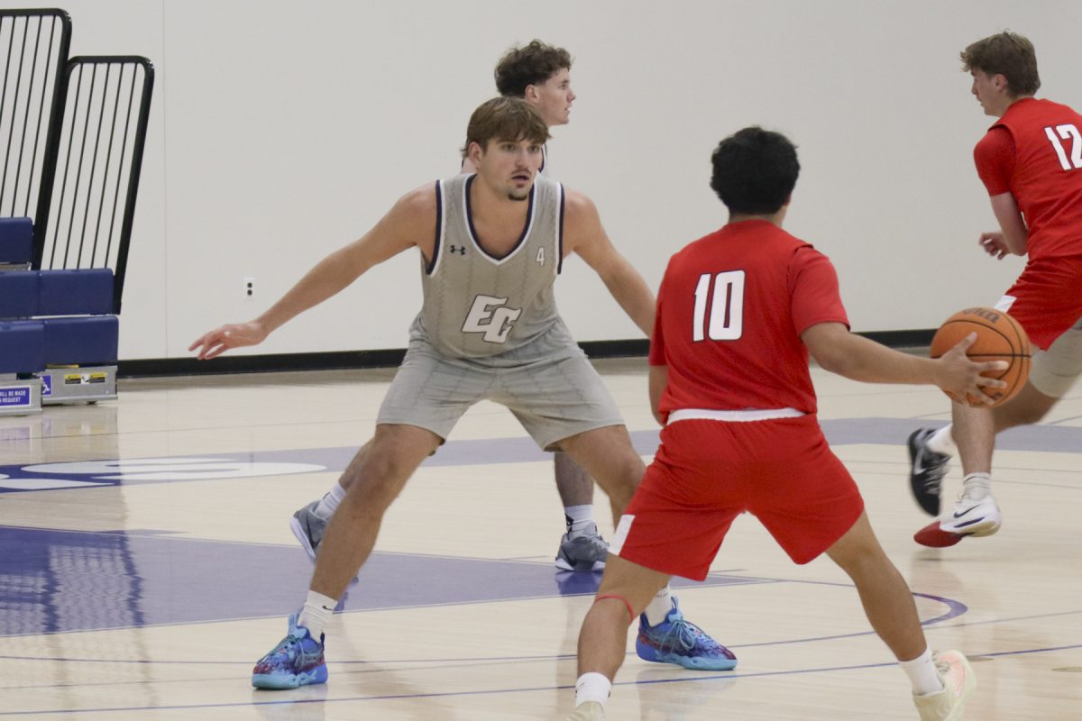 El Camino College Warriors forward Justin Cricri leads the defense as he puts pressure on Vaqueros guard Jesse Ybarra to make a move at the ECC Gymnasium on Friday, Oct. 6. Cricri finished the match with 20 points and eight rebounds. (Philip Kozel-Lopez | The Union)