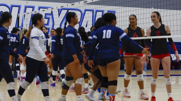 On Nov. 5, 2025, ECC Warriors close the game by shaking hands with Opposing team California state University, Long Beach after a game that took place at 6 p.m. in the gym located across from the Aquatic Center.