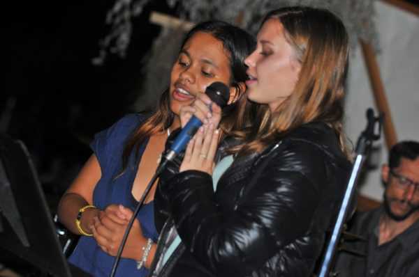 (LR) Christine Huston and a friend, both members of the gospel club on El Camino campus perform back up vocals for E Camino's fall annual battle of the bands. The battle of the bands is a collaborative effort involving the society of music and  El Camino's Save the Art's group (Taheem Lewis | The Union)