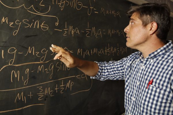 Haitkin talks animatedly about his journey as a physics professor and his goals for the course, in Room 112 of the Physics Building on Oct. 21. He said teaching at El Camino has been a meaningful opportunity, especially because of the students he works with. “I enjoy teaching the students,” Haitkin said. “I provide the lessons, but I want them to work together to build their knowledge; and seeing their faces when they solve a problem is the best part.” (Chelsea Alvarez | The Union)