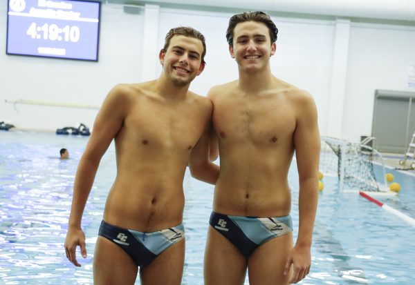 ECC Waterpolo Warriors, Cooper and Robbie Josic, 19, pose in front of pool after practice on Thursday, Oct. 23 at the Aquatics Center. (Savannah Anderson | The Union) Photo credit: Savannah Anderson