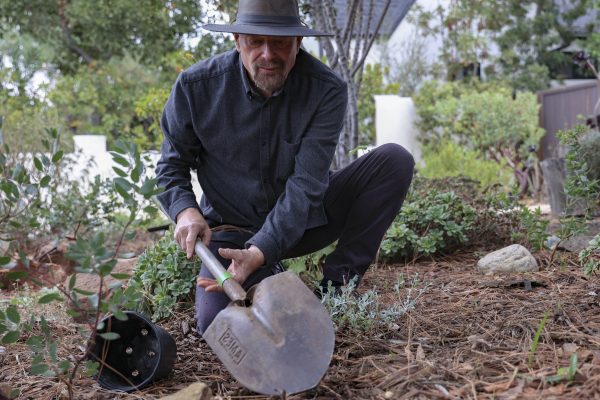 Micheal Miller working in his garden at home. (Photo by Oriana de Quay)
