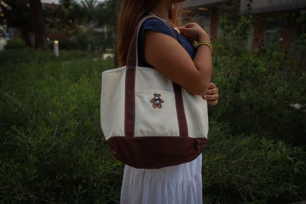 Christine Huston, 19, a communications major likes that she can style her tote bag with her outfit. (Kaitlyn Gochez)