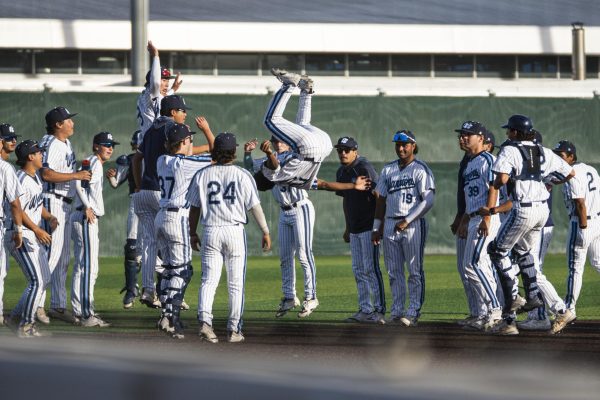The El Camino College Warriors shut out the Long Beach City College Vikings 5-0, and Warriors' infielder Peyton Tate backflips to celebrate the win on Tuesday, Feb 24, at the ECC baseball field. This was the first of a three-game series against the Vikings, where they face off next at the Vikings on Thursday, Feb. 26, at 2:00 pm. (Ryan Hirabayashi | The Union)