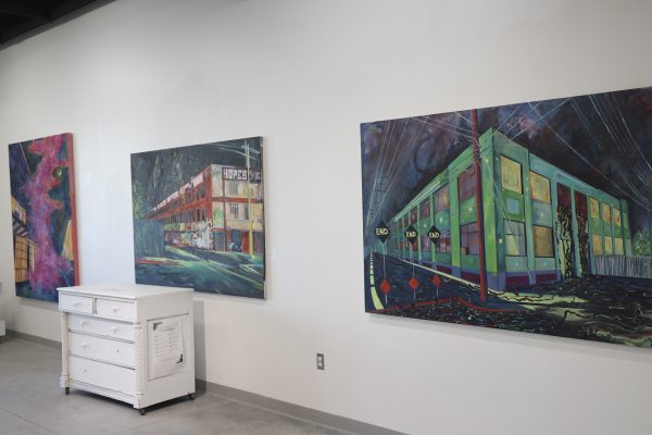 Keiva Campbell’s painting “A Tribute to April Savino the sister I never met,” presented at the Art Gallery exhibition onThursday, Feb. 26, 2026. “Kevia painted these as a way to imagine where Kevia’s half sister would be around the city” said Sophia Cervantes, 26, Studio and Fine art major.