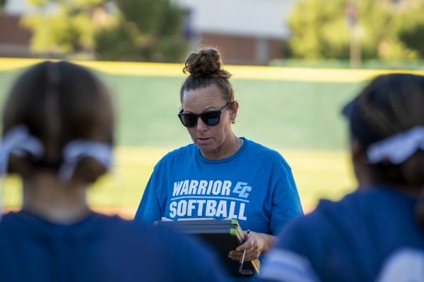El Camino College Head softball coach Jessica Rapoza addresses her team following the loss against Orange Coast on Wednesday, March 18. (Gael Gallardo | The Union)