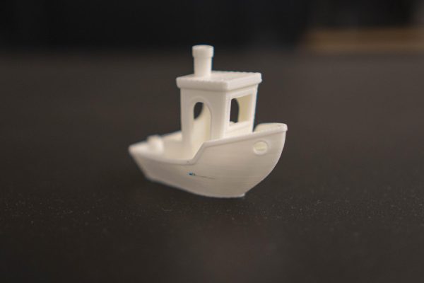 3D printed mini tug boats are placed throughout the room in the Industry Technology Education Center on Tuesday, March 10. (Ryan Hirabayashi | The Union)