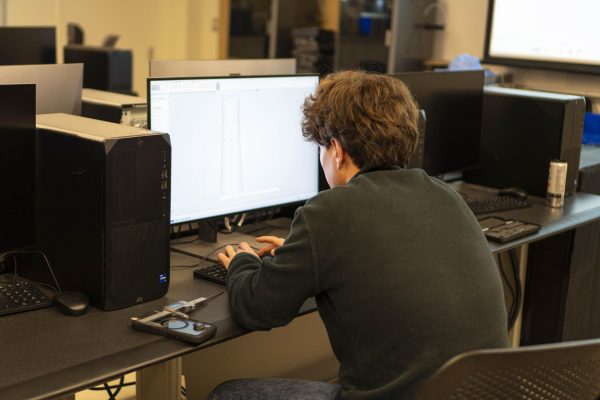 El Camino College student and 3D printing club member, Jordi Lora, a mechanical engineering major, designs a medieval castle phone stand in the Industry Technology Education Center on Tuesday, March 10. Lora is working on a few other projects and has been involved with the club for his two years at El Camino College. (Ryan Hirabayashi | The Union)