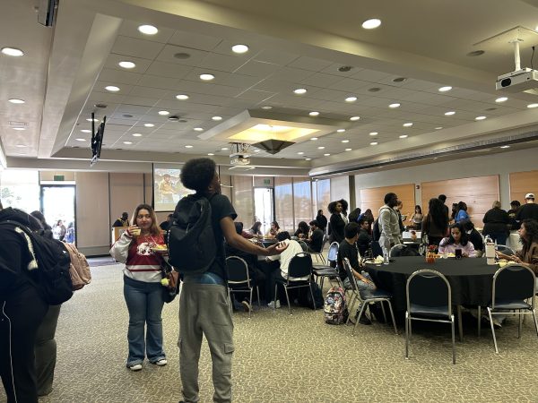 Students and employees attend the Taste of Soul event on Tuesday, March 3, in the El Camino College East Dining Room. (Isaac Ramirez | The Union)