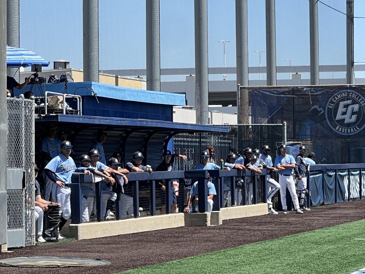 The Warriors men's baseball team and head coach Grant Palmer watch the game against the Compton College Coyotes from the dugout at the Warrior Field on Saturday, April 5, 2025. The Warriors won 14-1 in their last match against Comtpon for the 2024-2025 season. (Jamila Zaki | The Union)