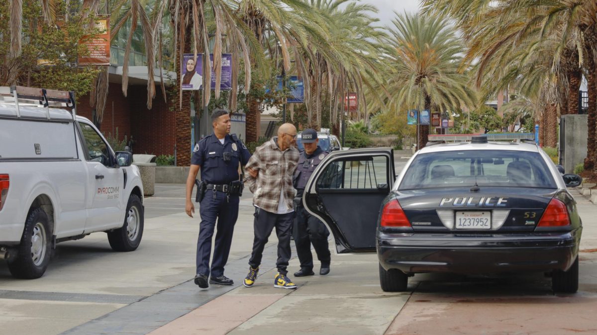 Officer Shahbaz Zaidi arrested a suspect after an altercation involving a threat was reported in the Physical Education Building's locker rooms. Responders on the scene from the El Camino College Police Department prohibited any interviewing, advising the victim involved not to speak with any of The Union's reporters as the investigation has not been conducted yet. (Madison Moody | The Union)