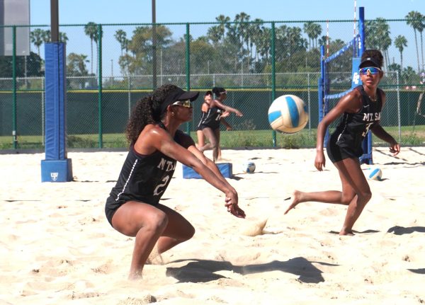 Jasmyn Stampley (2) of Mt. San Antonio College reacts quickly to receive a serve during a hard-fought beach volleyball match against El Camino College on Friday, March 20, 2026. Mt. SAC defeated El Camino 2–1 in the matchup, the only match to go to a third set.