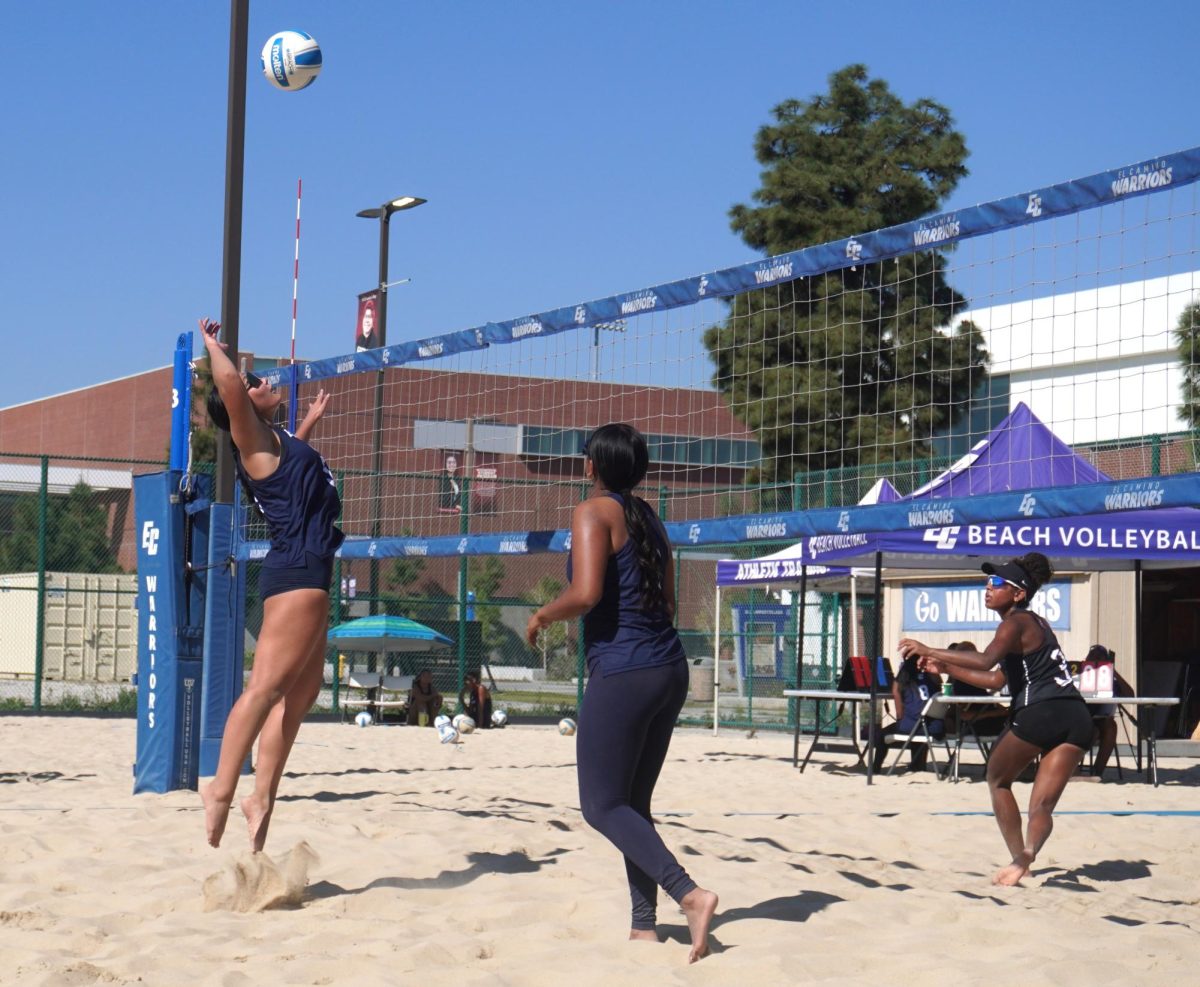 Justine Sapitanan (18), of El Camino College, attacks the ball during a hard-fought beach volleyball match against Mt. San Antonio College on Friday, March 20, 2026. Despite forcing a third set, El Camino lost the match 2–1, contributing to Mt. SAC's 5–0 overall victory. (Juan Carlos Cardoso | The Union)