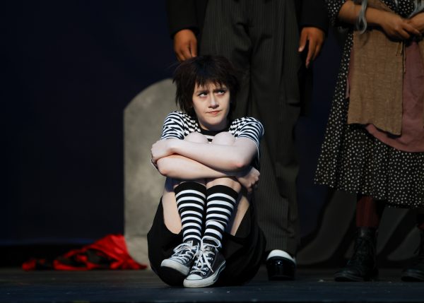 Amalthi Carter, 20, plays the role of younger brother Pugsley in the Addams Family Musical. (Matthew Beck | The Union)