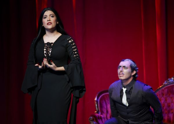 Characters Morticia and Gomez Addams played by El Camino College students in the campus theater during dress rehearsals on Wednesday, April 29 in the Campus Theatre. (Matthew Black