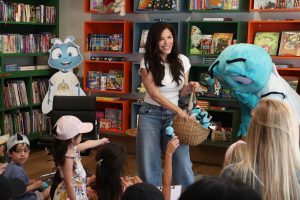 Lauren Sánchez Bezos hands out plush toys of Flynn, the insect protagonist of “The Fly Who Flew” book series at a Summerland-based event in March. She released her first book, “The Fly Who Flew to Space,” in 2024 and the sequel, “The Fly Who Flew Under the Sea,” this year. (Photo by Chelsea Lauren)