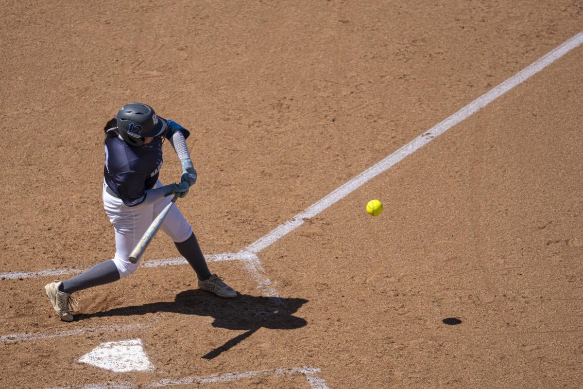 El Camino College outfielder Emily Gamboa takes a swing at the ECC softball field on Thursday, April 2. Gamboa and the Warriors shut out the East LA College Huskies 3 - 0. (Ryan Hirabayashi | The Union)