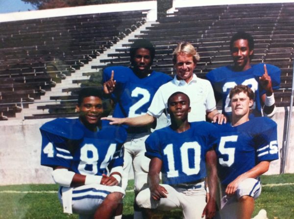 Former ECC football coach John Featherstone next to the 1987 football team. (Photo provided by Kevin Ray Harris)