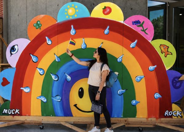 Julia Martin viewed a rainbow mural outside of the Art Gallery at El Camino College Monday, May 18. As an Ally, Martin said she supports the LGBTQIA+ community after her sister recently came out and because many of her friends are part of the community. Martin said she is happy her sister finally feels comfortable being herself. (Evelyn Wimberly | The Union)